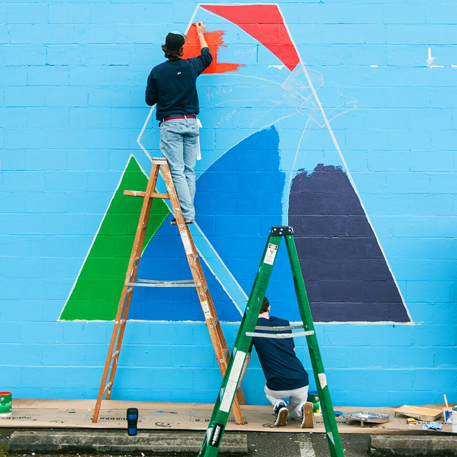 students painting the Parkland Community Wall