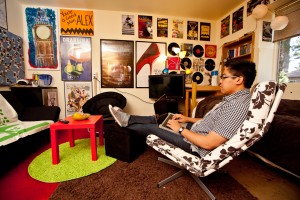Student relaxes in his furnished room