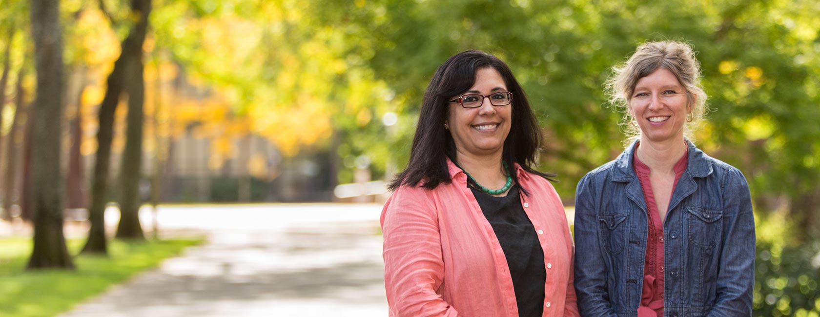 Associate Professor of Hispanic Studies Giovanna Urdangarain and Associate Professor of French Rebecca Wilkin