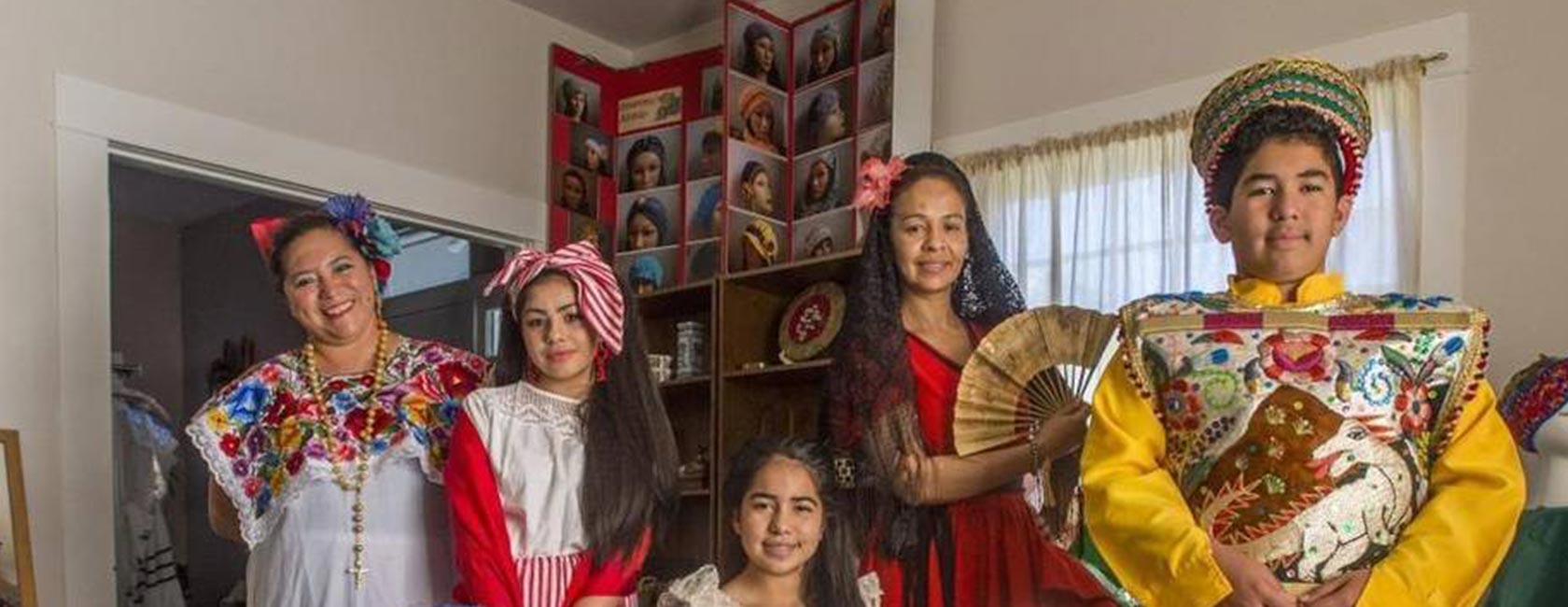 Participants in Tacoma’s Latin Arts Festival wearing outfits from Central and South America.