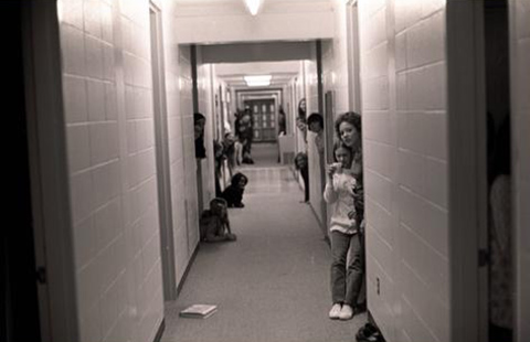 PLU students in a hallway in Foss Hall in 1967.