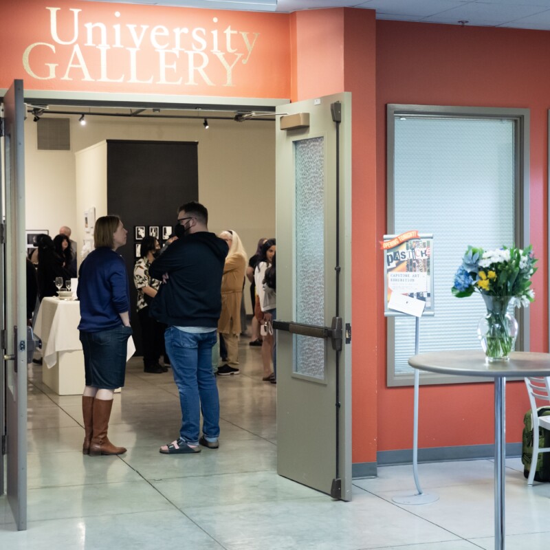 The PLU community gathers in the University Gallery for the 2024 Senior Exhibition