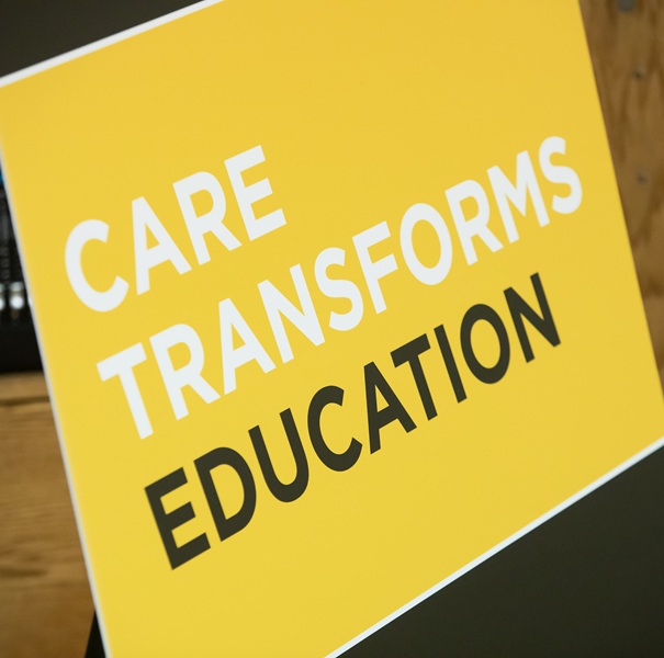 A poster that says "Care transforms education"