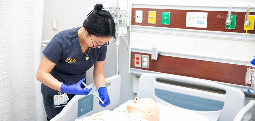 PLU student working in a clinical practicum.