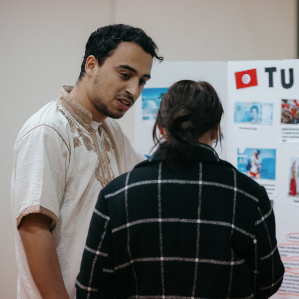 tunisian student teaching PLU students during global get down