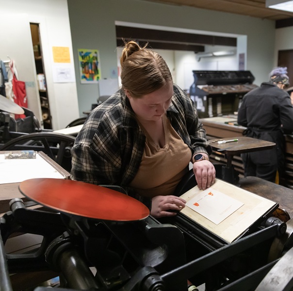 Students doing letterpressing
