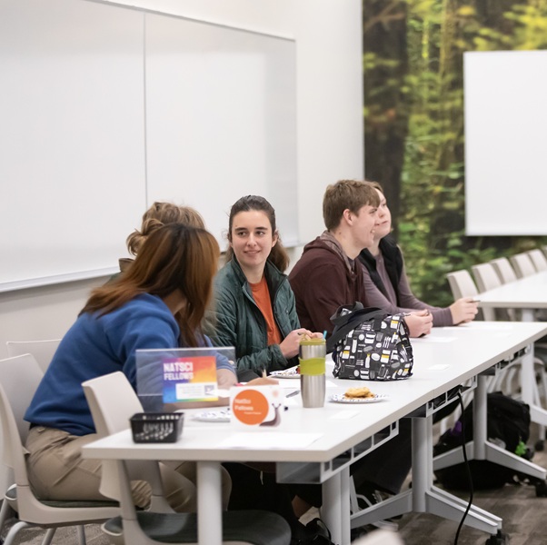 Students chatting in a classroom