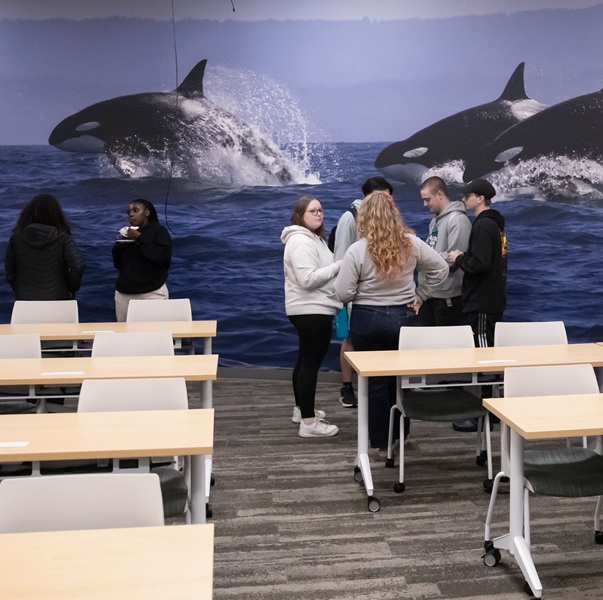 Students chatting in a classroom