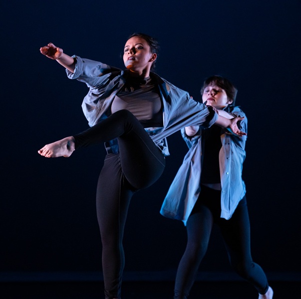 Two students dancing