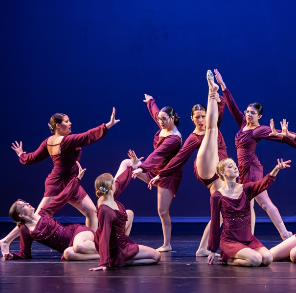 Group dance, students in red dresses