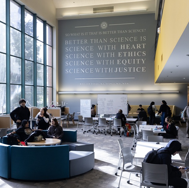 The William Foege quote wall in the lobby of the Rieke Science Center