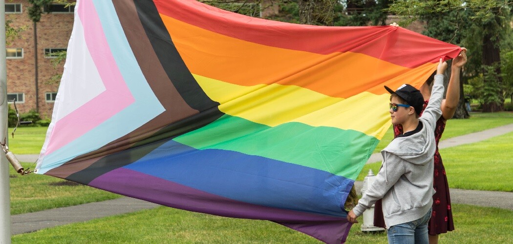 Pride flag raising at PLU Friday, July 12, 2019. (Photo/John Froschauer)