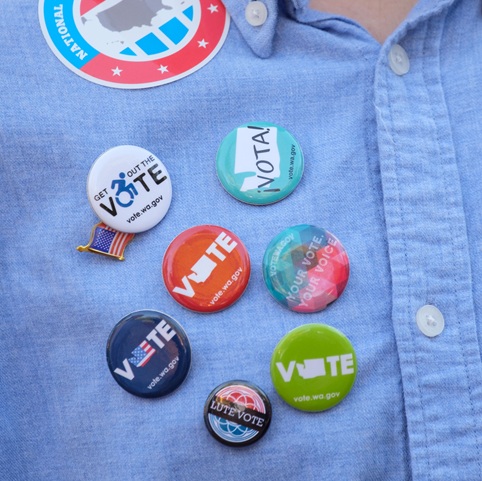 Vote buttons on a t-shirt