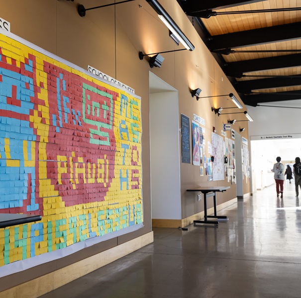 A hallway with students