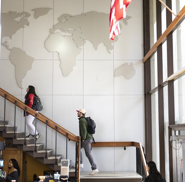 Students walking up the stairs in Hauge Administration building