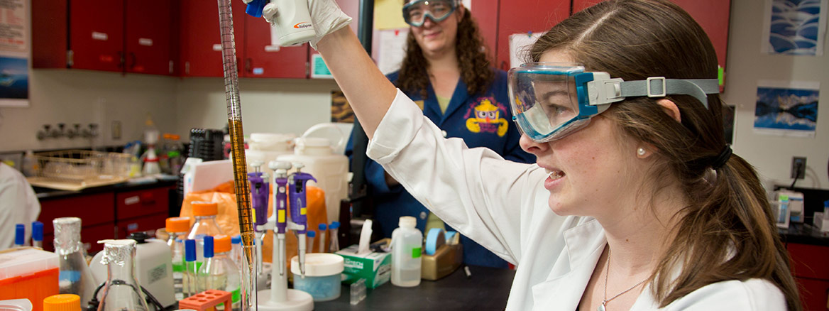 student and professor in chemistry lab