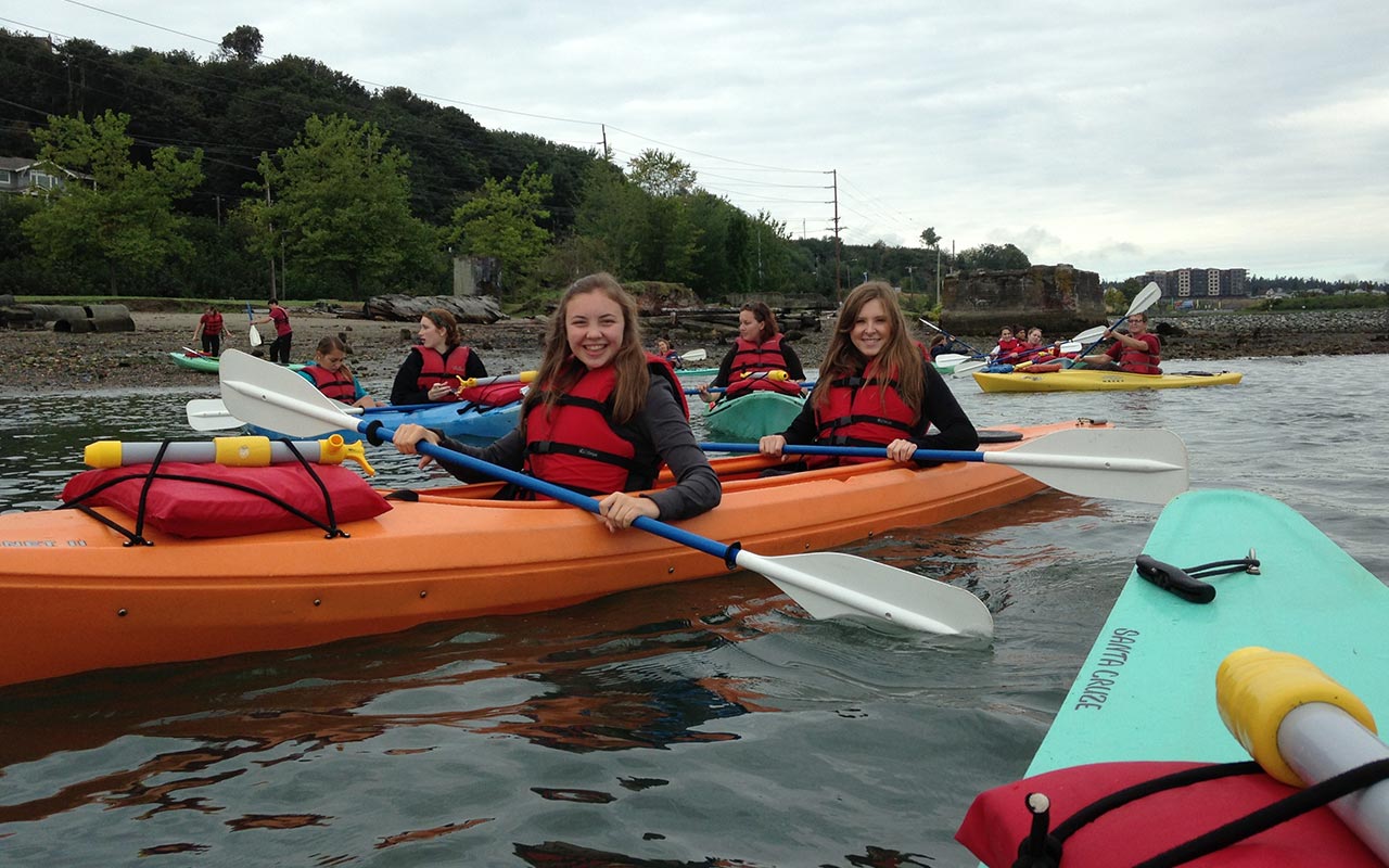 PLU students kayaking on the Puget Sound.