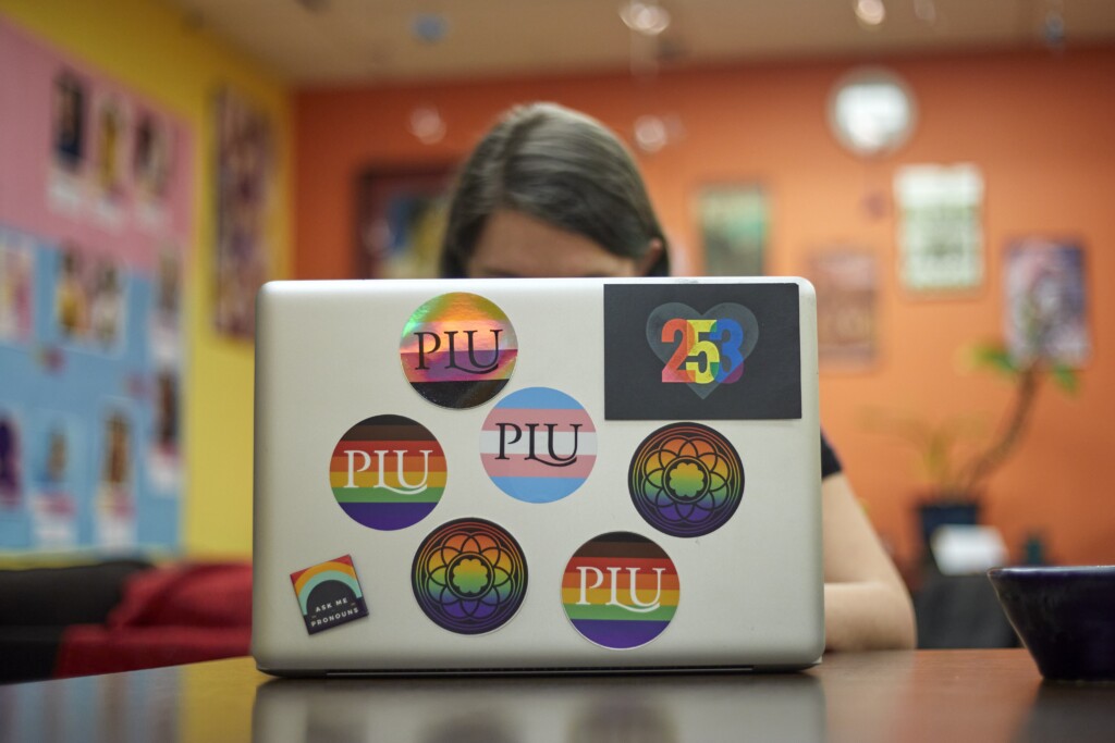 Laptop adorned with LGBTQ+ stickers in the DJS center, Monday, June 6, 2022, at PLU. (Photo/John Froschauer)