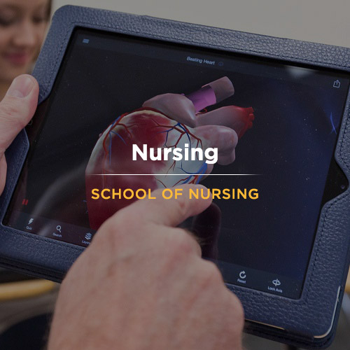 Gary Mahon showing ways of using tablet and phone apps for nursing to students at PLU on Wednesday, Feb. 25, 2015. (Photo/John Froschauer)