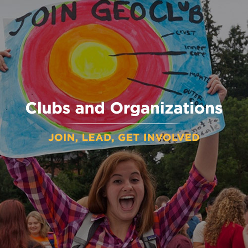 Smiling person holding a colorful poster about joining a Geo Club, featuring a diagram of Earth's layers. The image promotes involvement in clubs and organizations with the text Join, Lead, Get Involved. Trees are in the background.