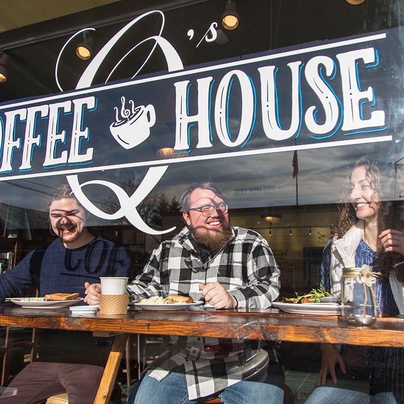 Three students enjoying lunch at the Coffee House