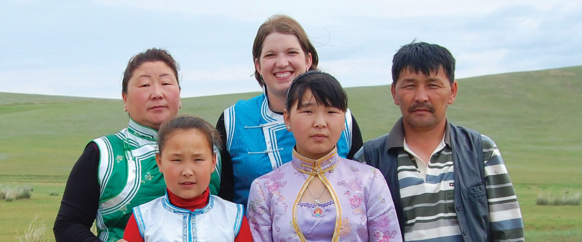 Bonnie Nelson '08 served in the Peace Corps in Mongolia - she is seen pictured with some people of Mongolia