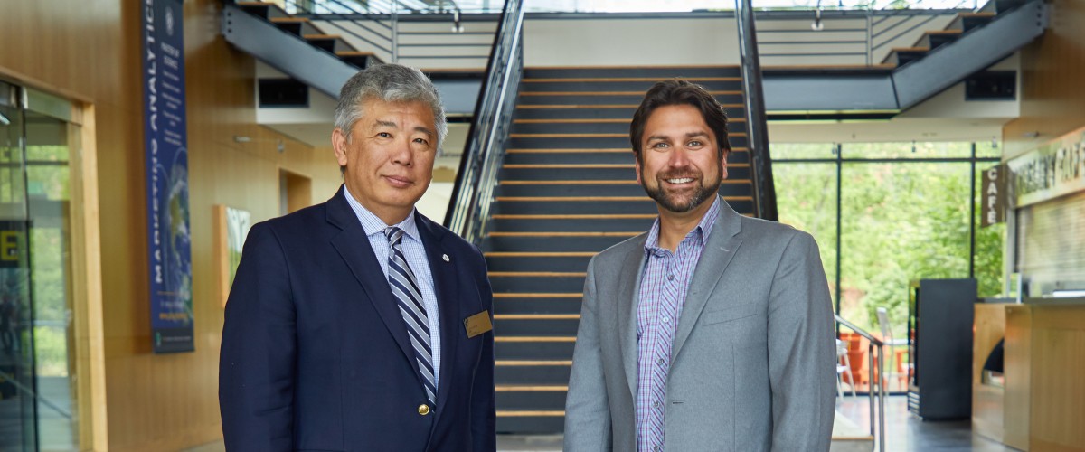 Justin Foster ’02, and School of Business Dean Chung-Shing Lee photographed in the Morken Center for Learning & Technology at PLU, Wednesday, July 3, 2019. (Photo: John Froschauer/PLU)