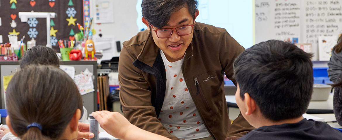 PLU students Jimmy Aung and Jamie Escobar (not pictured) led a science class at Four Heroes Elementary as they explore the education through a grant funded program.