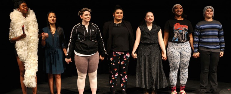 The cast of "Spectrums of Color" takes a curtain call after a performance.