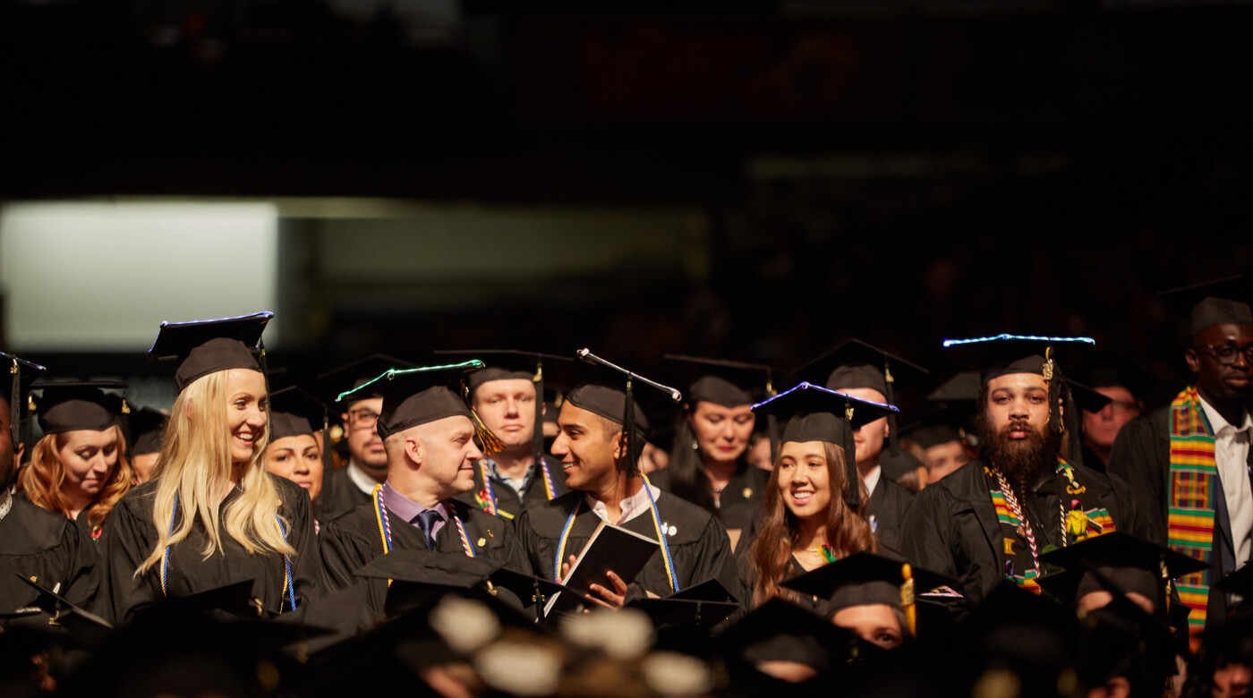 Students in cap and gown.