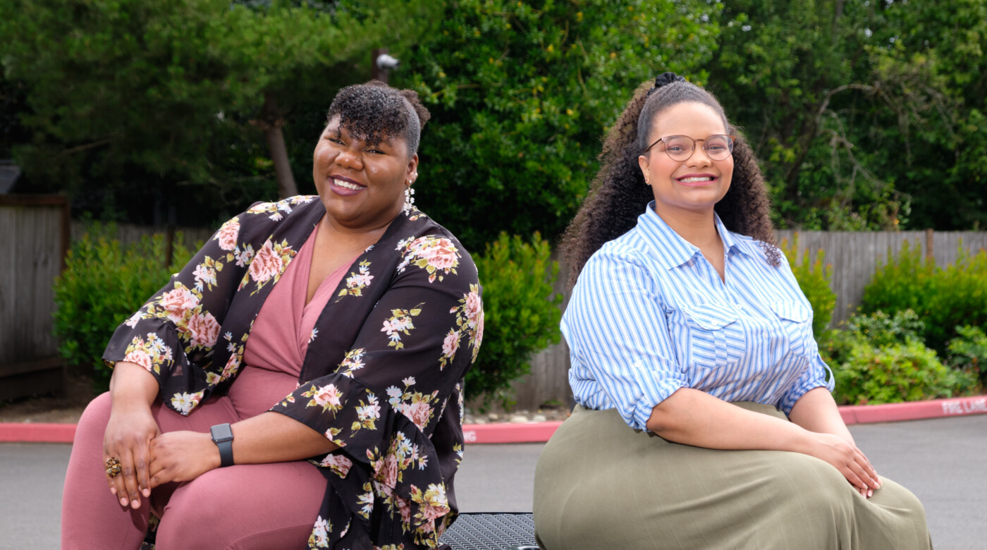 Gilchrist and Nicole Jordan sit together on campus.