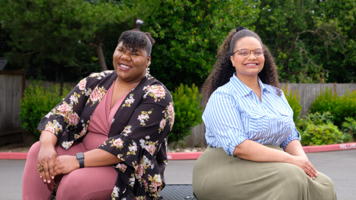 Gilchrist and Nicole Jordan sit together on campus.