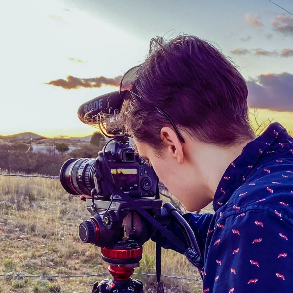 Co-Director of Photography Hallie Harper filming part of the border fence at sunset.