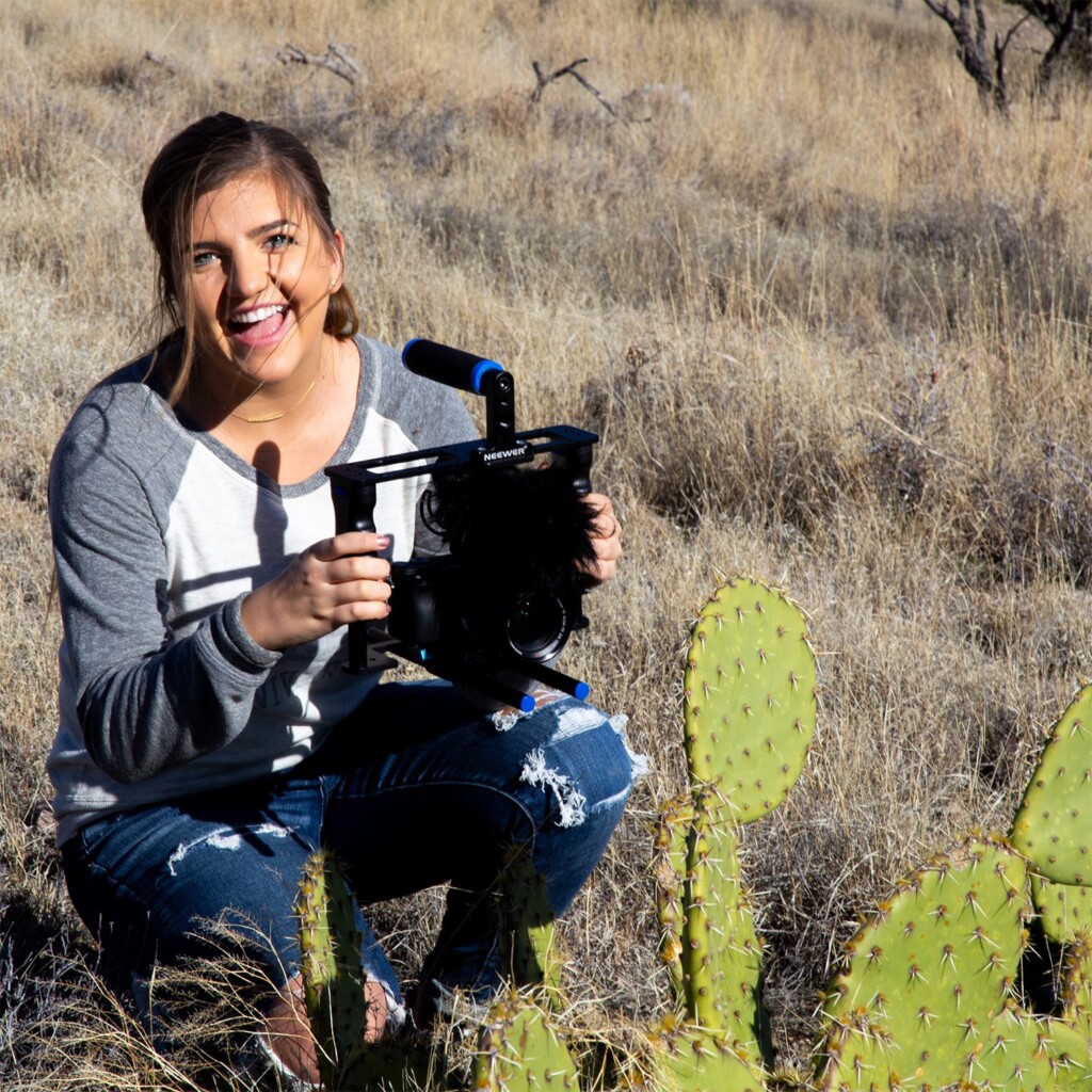 Co-Director of Photography Hanna McCauley filming a cactus in the Arizona desert.