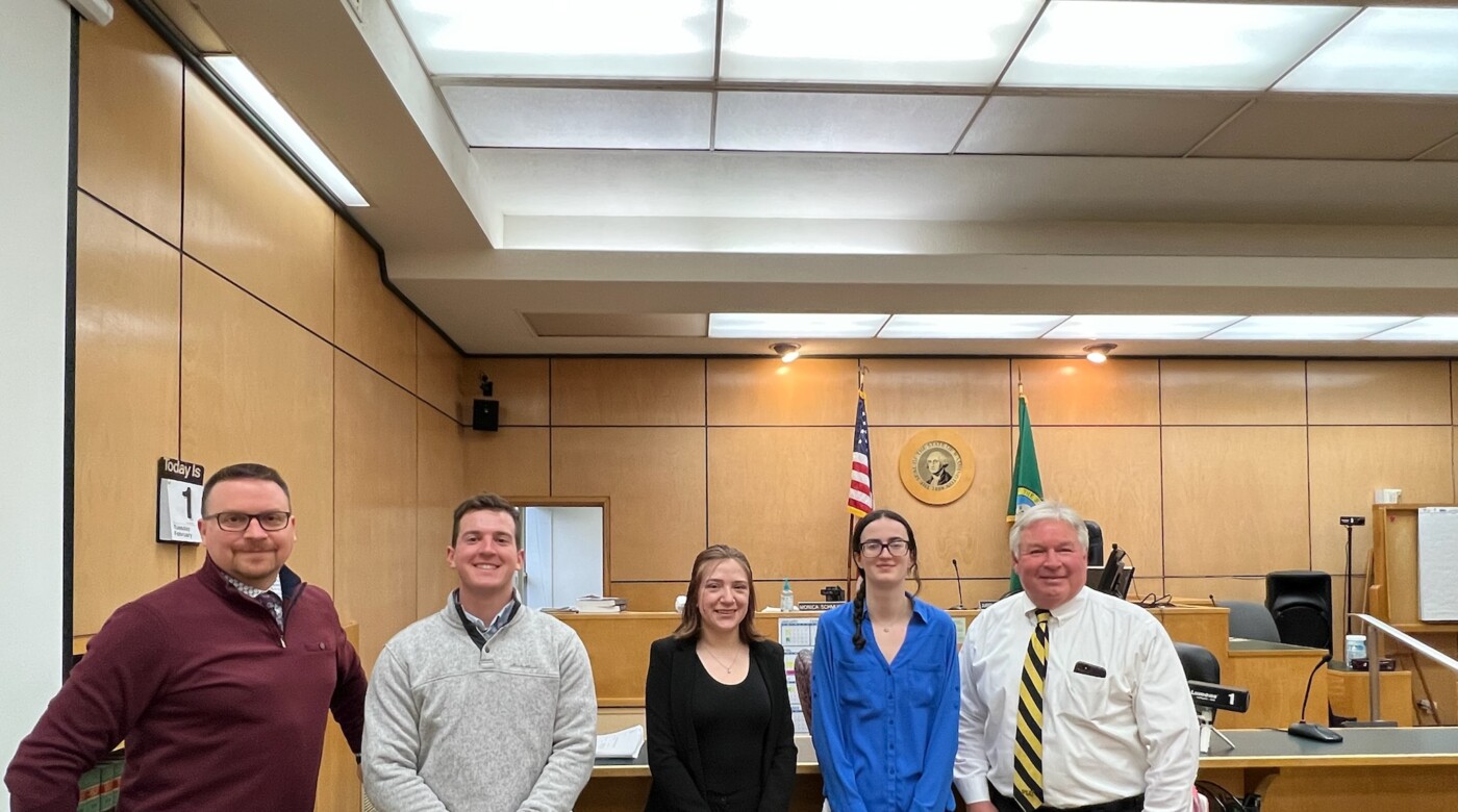 Image: (From left to right) Honorable Philip K. Sorensen, Connor Lemma ’22, Makaela Whalen ’23, Calissa Hagen ’24, Honorable Clarence Henderson, Jr. (photo courtesy of Judge Sorensen)