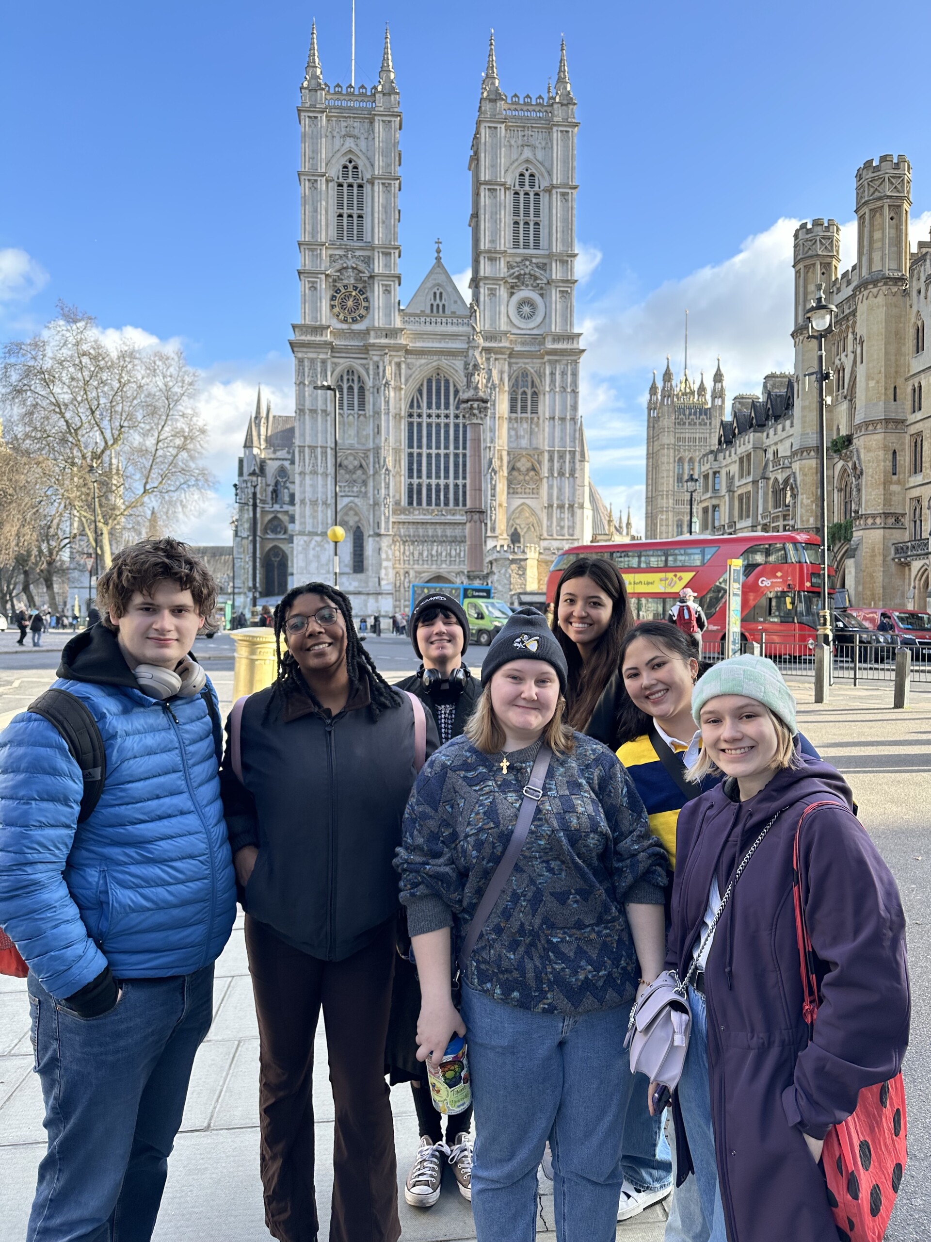 A group of students stands in front of Westminster Abbey.