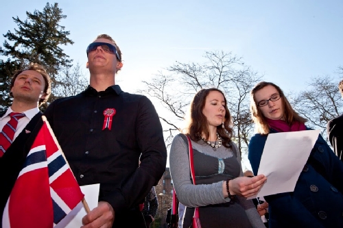 Scandinavian Studies Students holding Scandinavian flag