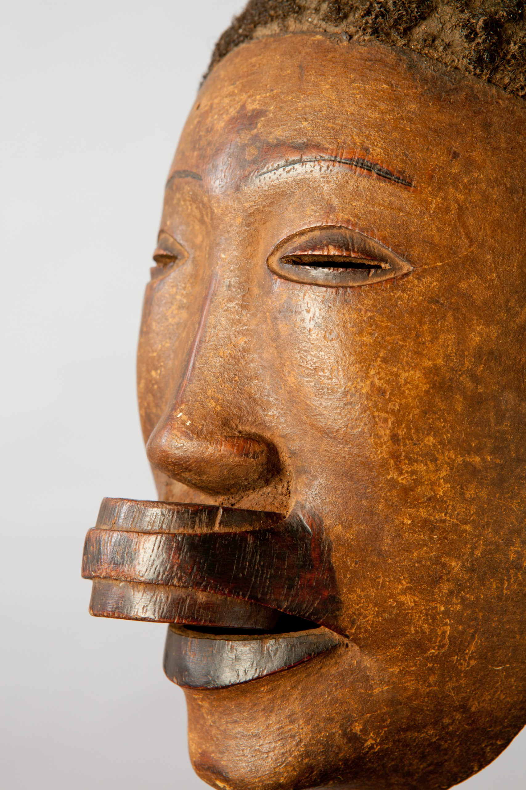 African artifacts part of the collection on display at the Mortvedt Library likomba-mask