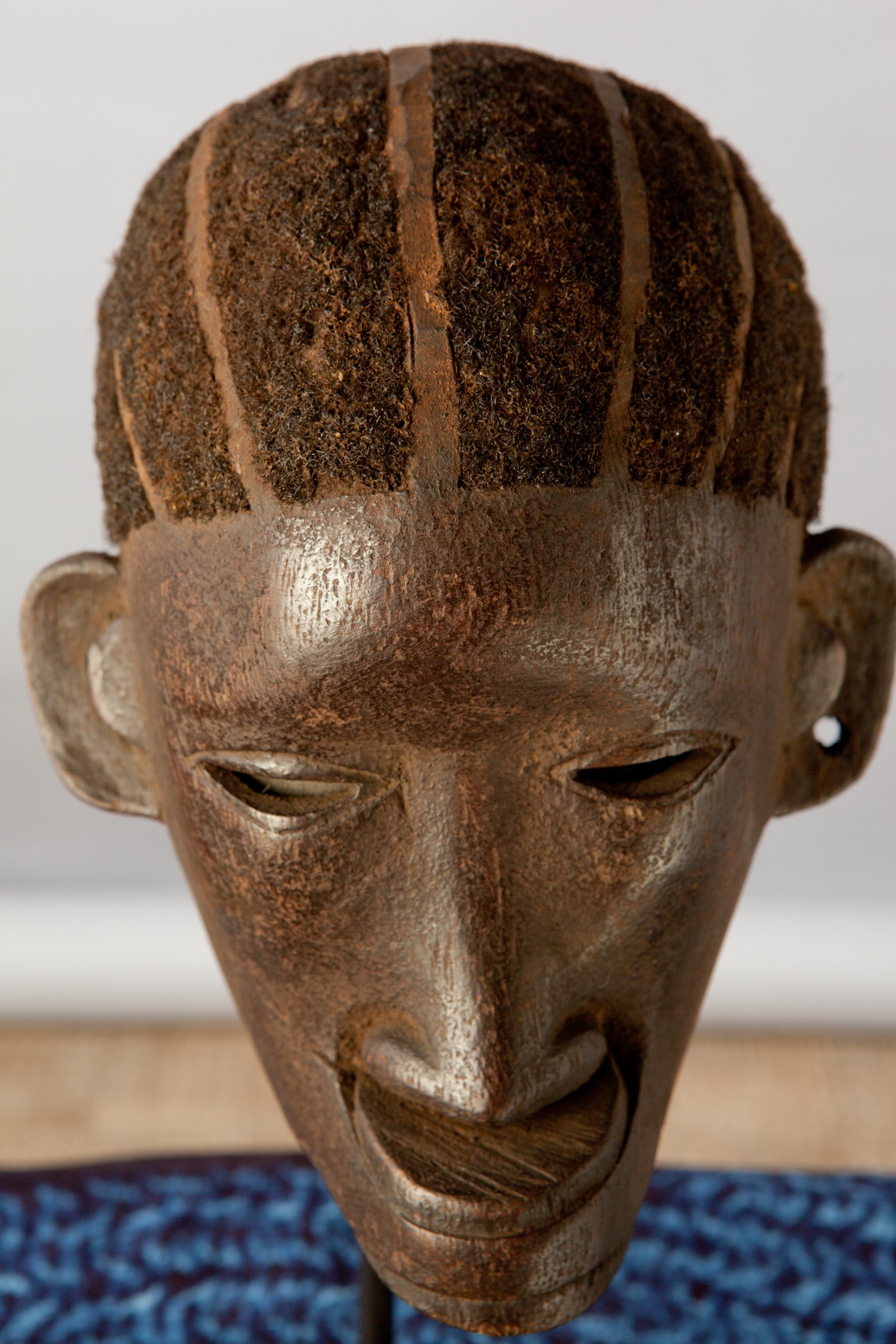 African artifacts part of the collection on display at the Mortvedt Library likomba-mask