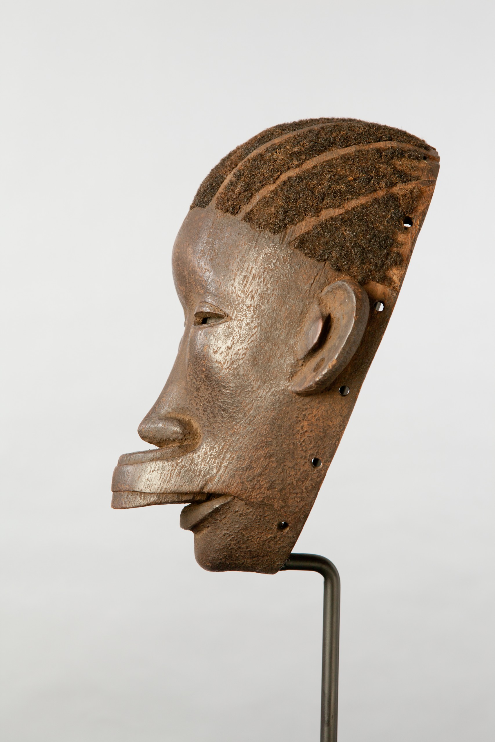 African artifacts part of the collection on display at the Mortvedt Library likomba-mask