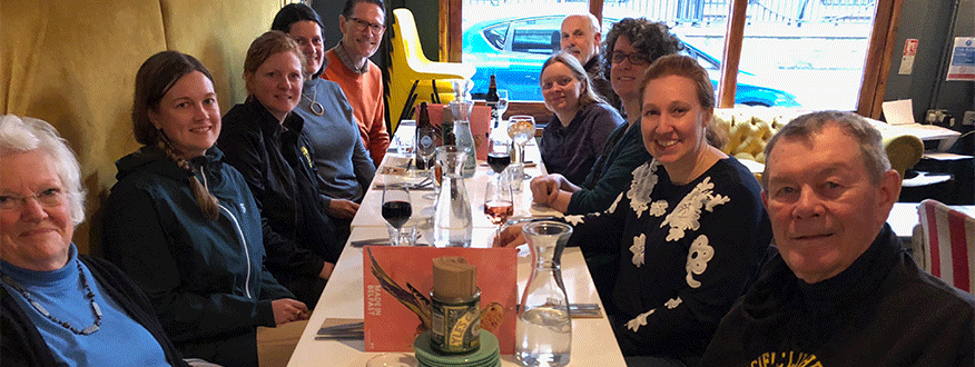 PLU alumni eating dinner in Northern Ireland.