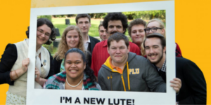 Image of a group of students standing behind a frame that says "I'm a New Lute!"