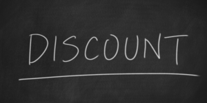 Image of the word discount written on a chalkboard