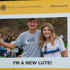 Image of two incoming students at PLU in a frame that reads 'I'm a New Lute!'