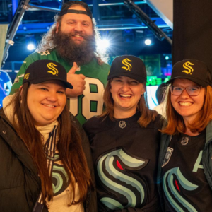 Image of PLU Lutes at the Seattle Kraken game as part of "Lutes in the Stands"