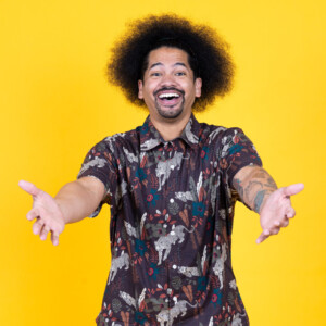Photo of Mychal Threets with yellow background, speaker for Jolita Benson Education Lecture