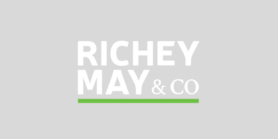 Richey May & Co Richey May & Co logo on light grey background