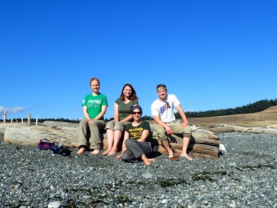 Photo courtesy of the Burke Museum. Grant Schroeder (right), Georgia Abrams (center), Emma Holmes (left) and Amanda Taylor (front) at South Beach, San Juan Island.