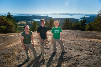 Photo courtesy of Theodore Charles. Emma Holmes (right), Grant Schroeder (center), and Georgia Abrams (Left) on Mt. Young, San Juan Island.