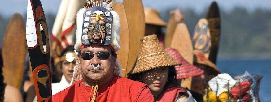 The Tlingit tribe wait to come ashore during the Ceremonial Landing and the commencement of Tribal Journeys.